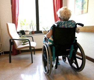 Elderly Person in Wheelchair