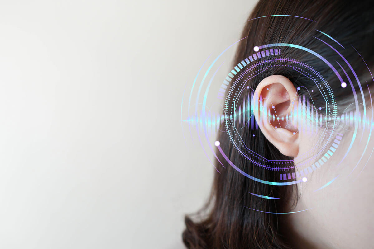 ear with sound wave graphics