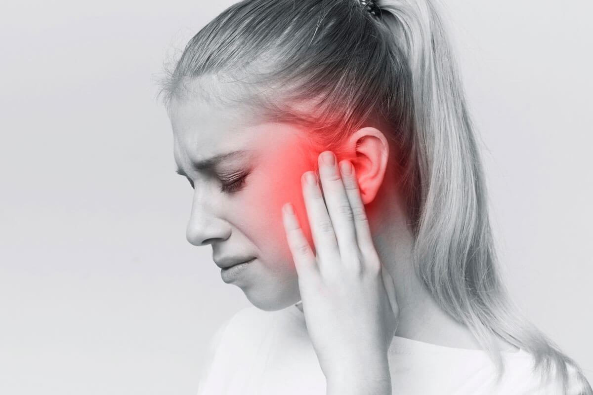 woman dealing with ear pressure